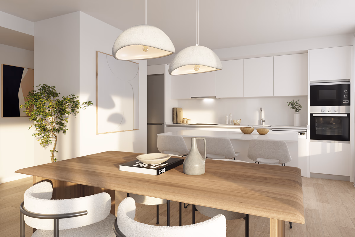 Cocina abierta con comedor en un apartamento de Lagune Homes